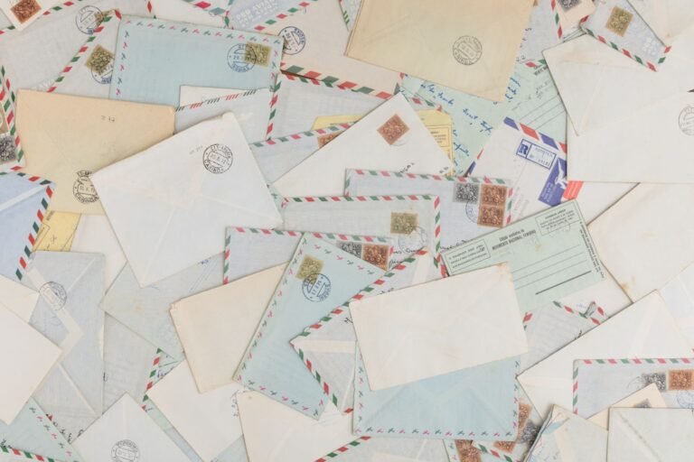 Scattered vintage envelopes and postcards