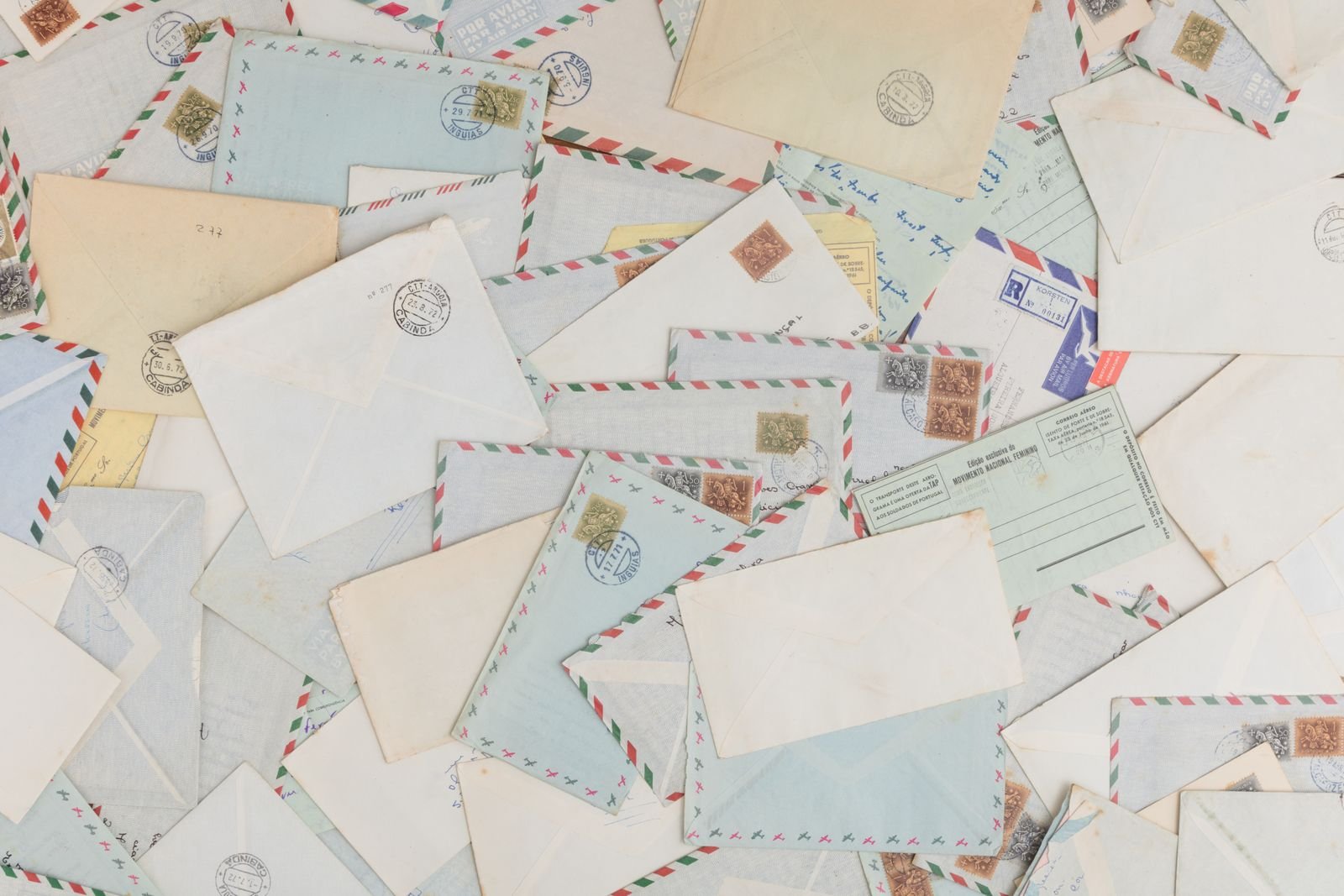 Scattered vintage envelopes and postcards